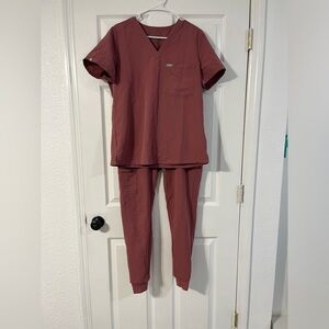 Figs Scrubs
Top- Size M 
Bottoms- S